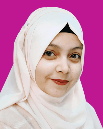 Hira Ashraf – Passionate Educator & Mentor Hira Ashraf wearing a soft pink hijab, smiling warmly against a gradient purple background.
